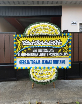 Papan Bunga Duka di Monggas